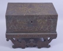 A FINE AND UNUSUAL EARLY 19TH CENTURY ANGLO INDIAN GILDED GREEN LACQUERED MINIATURE CHEST ON