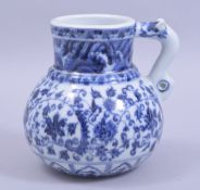 A CHINESE MING STYLE BLUE AND WHITE PORCELAIN JUG, the body painted foliate decoration, the neck
