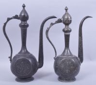 TWO FINE INDO PERSIAN ENAMELLED BRASS EWERS, each with scrolling foliate decoration, 39cm and 38cm