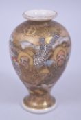 A JAPANESE MEIJI PERIOD EIGHT IMMORTAL SATSUMA VASE, decorated with eight immortals at waterside