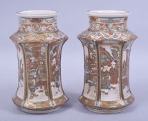 A PAIR OF JAPANESE SATSUMA SIX SIDED PORCELAIN VASES, both with hexagonal form body of six panels