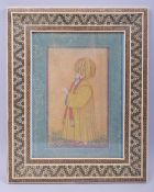 A PERSIAN QAJAR MINIATURE PAINTING OF A FIGURE, in a micro mosaic inlaid frame, framed and glazed,