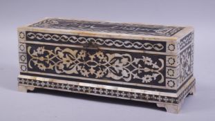 A TURKISH OTTOMAN MOTHER OF PEARL INLAID BOX with hinged lid, the mother of pearl inlay in the