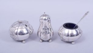 A CHINESE SILVER THREE PIECE CONDIMENT SET, comprising salt pot with blue glass liner, similar