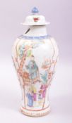 AN 18TH CENTURY CHINESE PORCELAIN VASE with associated cover, painted with panels of figures in an