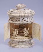 A JAPANESE MEIJI PERIOD CARVED IVORY BUDDHIST SHRINE, carved with immortal figures and openwork