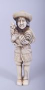 A JAPANESE MEIJI PERIOD CARVED IVORY NETSUKE - MAN AND COCKEREL, the man stood holding his