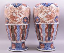 A GOOD LARGE PAIR OF JAPANESE IMARI PORCELAIN VASES, the body of each decorated in the imari palette