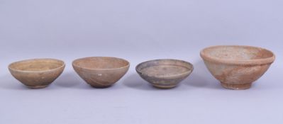 FOUR CHINESE TERRACOTTA BOWLS, various sizes (4).