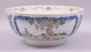 A QIANLONG PORCELAIN PUNCH BOWL, decorated in the valentine pattern, 29cm diameter (af).
