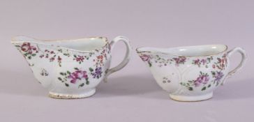 A PAIR OF CHINESE FAMILLE ROSE SAUCE BOATS, painted with flowers, each 19cm long.