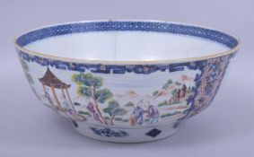A LARGE 18TH CENTURY CHINESE PORCELAIN PUNCH BOWL, painted with panels of figures in a landscape,