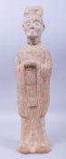 A LARGE TERRACOTTA MODEL OF A COURT OFFICIAL, possibly han dynasty, 56.5cm high.