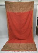 A LARGE PAISLEY SHAWL, red ground with typical paisley design borders.