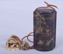 A JAPANESE LACQUER FOUR CASE INRO, with gilt decoration of bird and trees, the string with ivory