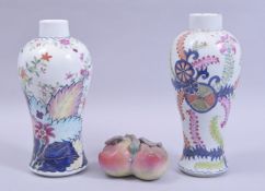 TWO CHINESE STYLE FAMILLE ROSE PORCELAIN VASES, together with a famille rose porcelain twin peach