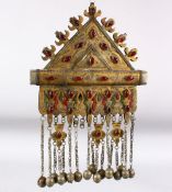 AN ISLAMIC CEREMONIAL NECKLACE with large metal pendant, the pendant 22cm x 21.5cm.