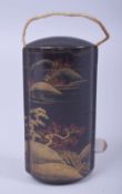 A JAPANESE LACQUER FIVE CASE INRO, with gilt decoration depicting trees and mountains, 9cm.