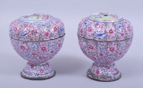 A PAIR OF 19TH CENTURY CHINESE CANTON ENAMEL BOX AND COVERS, decorated with figures in landscapes
