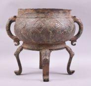 A LARGE ARCHAIC BRONZE TWIN HANDLE CENSER, with zoomorphic handles and supported on four curving