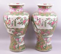 A LARGE PAIR OF CHINESE FAMILLE ROSE / VERTE PORCELAIN VASES, painted with panels of female
