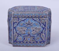 A FINE 19TH CENTURY INDIAN KASHMIRI ENAMELLED SILVER TEA CADDY, with embossed and chased floral