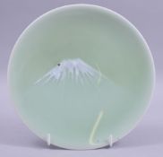 A JAPANESE MEIJI / TAISHO PERIOD CELADON MT. FUJI PORCELAIN PLATE, celadon ground with splash
