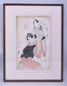 A 19TH CENTURY JAPANESE WOODBLOCK PRINT, depicting a male and female figure, framed and glazed,