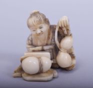 A JAPANESE MEIJI PERIOD CARVED IVORY NETSUKE - MAN AND GOURD, the sectional netsuke depicting a