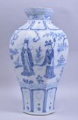 A LARGE CHINESE YUAN STYLE BLUE AND WHITE OCTAGONAL FORM VASE, the body decorated with figures and