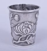 A CHINESE SILVER SAKE CUP BY WANG HIN, embossed and chased with a floral design, 4.5cm high, 0.9oz.