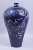 A LARGE CHINESE MING STYLE SACRIFICIAL BLUE AND UNDERGLAZE RED VASE, the body decorated with dragon,