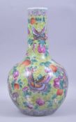 A LARGE CHINESE GREEN GLAZE PORCELAIN VASE, colourfully painted with large butterflies and fruit,