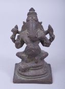 AN 18TH/19TH CENTURY INDIAN FIGURE OF GANESHA, 10cm high.
