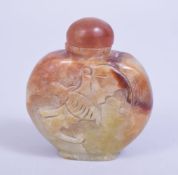 A CHINESE CARVED RUSSET JADE BAT SNUFF BOTTLE, body carved with bats, 6cm high.