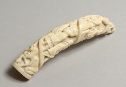 A TRIBAL CARVED HIPPO TOOTH, CIRCA 1870. 5.5ins.