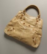 BALENCIAGA, PARIS, A LADIES BEIGE LEATHER HANDBAG.