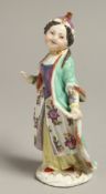 A MEISSEN FIGURE OF A FEMALE TURK standing on a scroll moulded base, the base impressed '25, c.