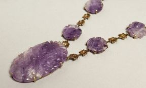 A PEARL AND AMETHYST NECKLACE