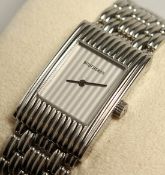 A BOUCHERON STEEL WRIST WATCH AND BRACELET. No. AK 416582.