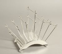 A CHRISTOPHER DRESSER SLVER PLATE SIX DIVISION TOAST RACK.