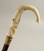 A BONE HANDLE WALKING STICK, ELEPHANT. 37ins long.