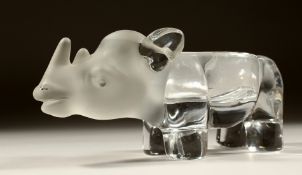 A CLEAR AND FROSTED GLASS ASHTRAY, modelled as a rhinoceros. 9ins long.
