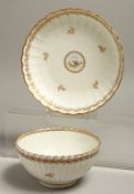 AN 18TH CENTRUY CAUGHLEY RARE FLUTED BOWL AND MATCHING SAUCER SHAPED DISH painted with two doves and