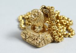 A GOLD PLATED LION SEAL ON A CHAIN