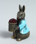 A NOVELTY PETER RABBIT PIN CUSHION