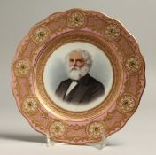 A LATE 19TH CENTRUY CAULDON PLATE painted with a portrait of LONGFELLOW by P. BRUN. Signed, under