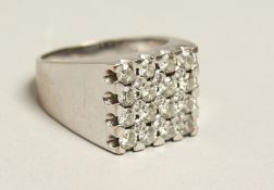A GENTLEMAN'S 18CT DIAMOND SET SQUARE RING.