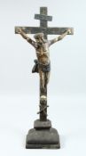 A LARGE 17TH /18TH CENTRUY NAIVE, CHRIST OF THE CROSS with scull and crossbones. 23ins high.