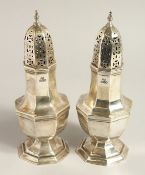 A PAIR OF HEXAGONAL SUGAR SIFTERS. Sheffield 1909, maker, Walker & Hall.